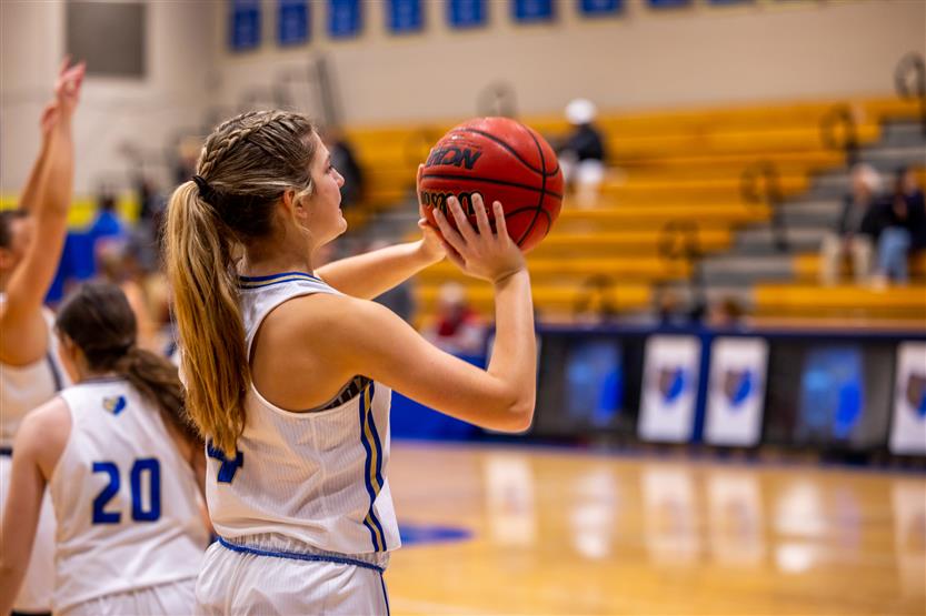 Students playing basketball